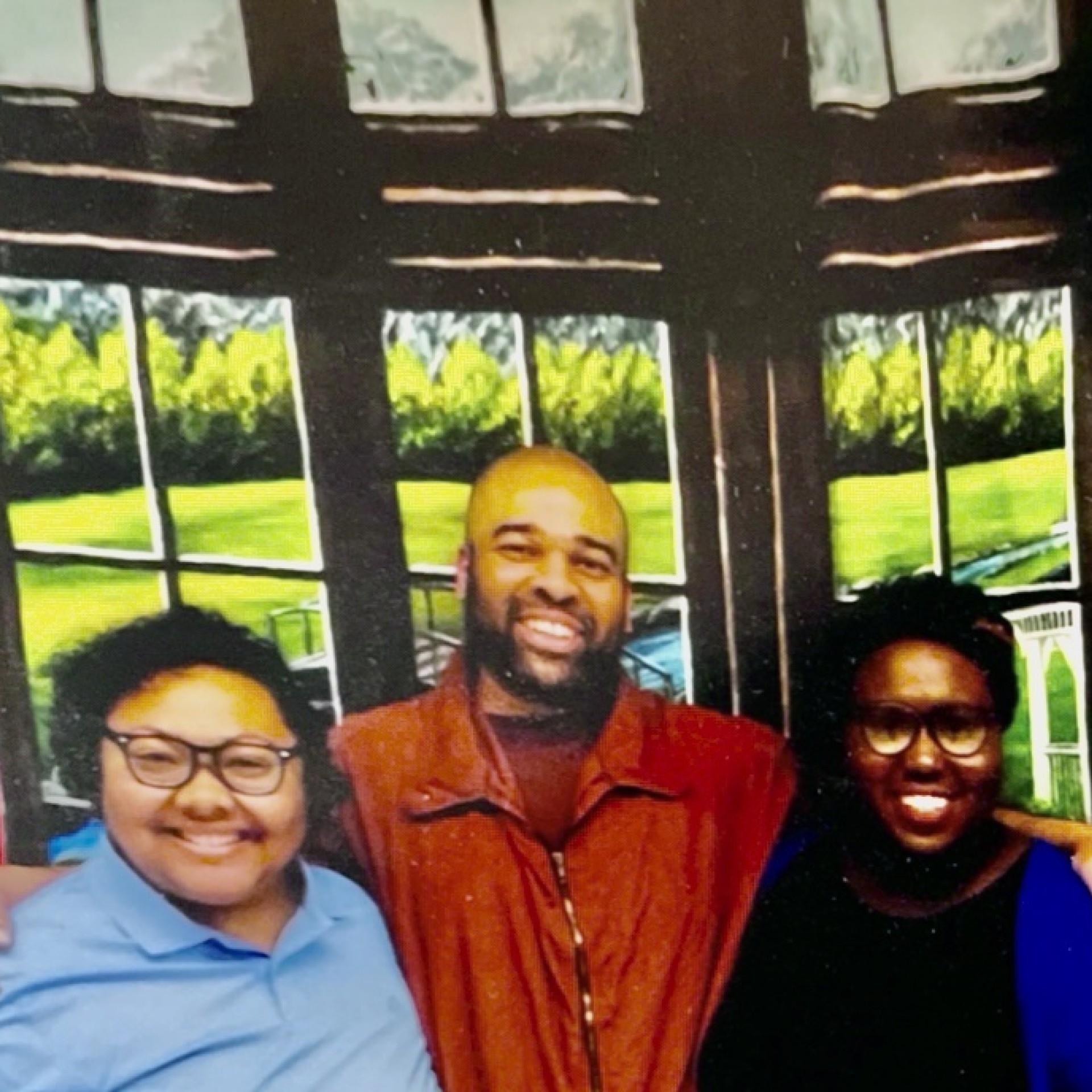 Darrick Hall and members of Amistad Law Project pose together for a photo on the occasion of the first visit where they weren't separated by a plexiglass barrier.